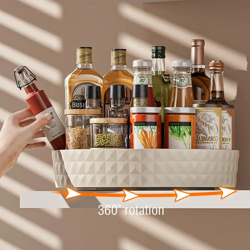 Cream white lazy susan cabinet organizer spinning 360-degrees for easy access to spices and condiment bottles