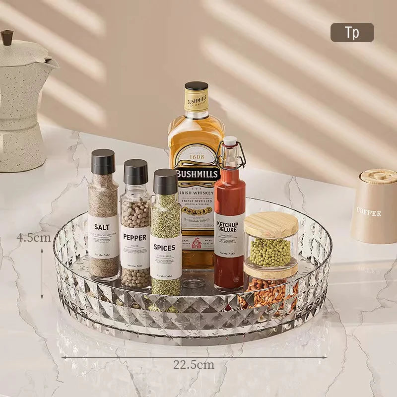 Transparent clear lazy susan spice organizer 22.5cm with salt, pepper, spices and condiment bottles on marble
