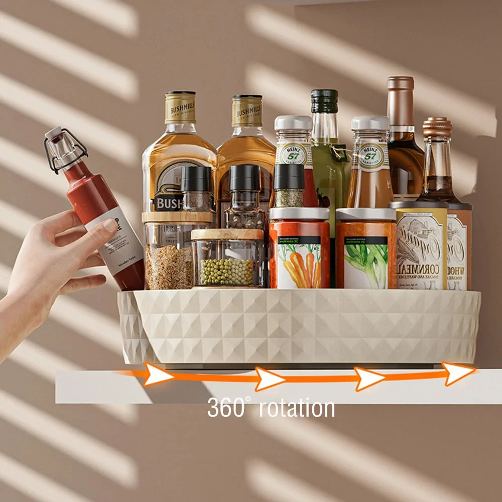 Cream white rotating lazy susan spice rack with 360-degree rotation arrows, hand reaching for condiment bottle